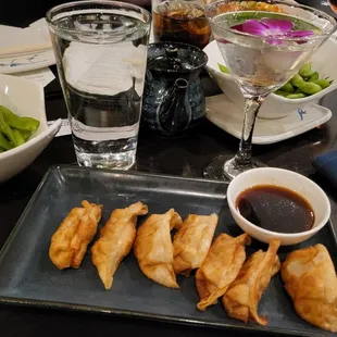 Gyoza and a cocktail