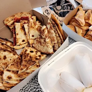 a box of quesadillas and french fries