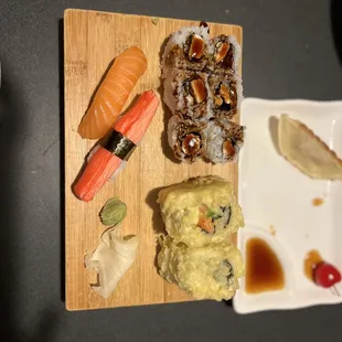 This is Salmon Nigiri, Snow Crab Nigiri, Rock N Roll, Teriyaki Roll