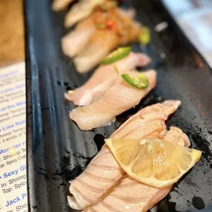 Seared Lemon Salmon (2 pcs) Yuzu Yellowtail (2 pcs)