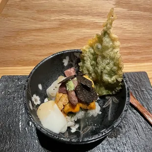 Special bowl with tempura leaf, poached quail egg, uni, scallop , roe, wagyu beef, and shaved truffle  Explosion of amazing flavors