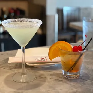 two cocktails on a table