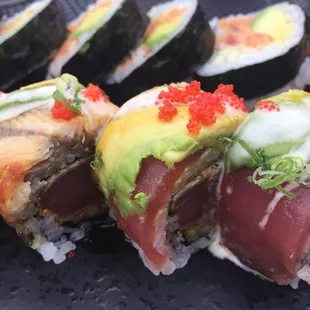 Wayzata roll and spicy tuna in background