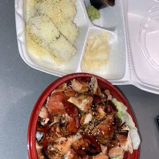 a plate of chicken, rice, and broccoli
