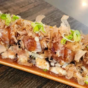 Takoyaki, $8, minus $1.25HH - 2 Stars