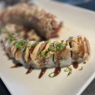 a sushi roll on a plate