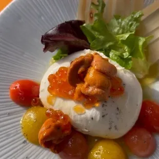 Uni Burrata
Burrata cheese, sea urchin(Uni), salmon caviar, yuzu, cherry tomato, olive oil, shiso