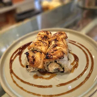 Baked Salmon Special Roll
Crab meat, avocado, cucumber, baked Salmon on top