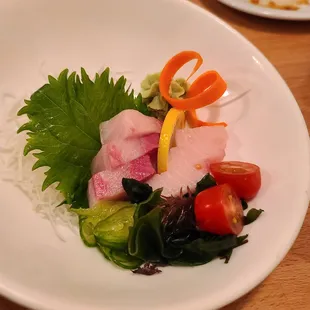 a plate of food with a pair of scissors