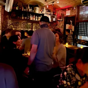 people sitting at a bar