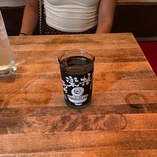 a woman sitting at a table