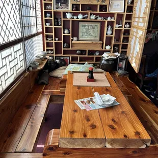 a wooden table and benches