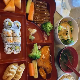 Dinner Bento Box with Beef Teriyaki and Salmon. Fried Rice, Miso Soup, Garden Salad.