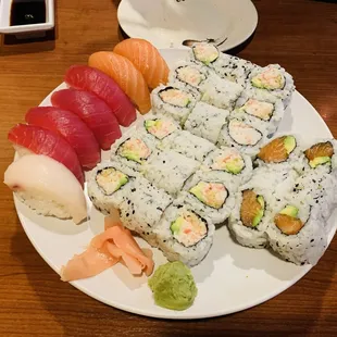Happy hour sushi rolls (nigiri, 3 crunchy rolls, and 1 salmon avocado roll)