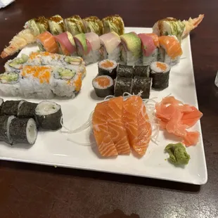 Rocky 2 roll (I think), rainbow roll, California roll, salmon roll, scallop roll, and salmon sashimi