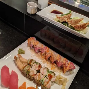 Gyoza, tiger roll with spicy mayo drizzle, rocky II no rice and tuna and salmon sashimi. So good!