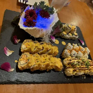 Jimmy smith roll (left), double roll (top), spicy salmon roll (middle right), Times Square roll (bottom right)