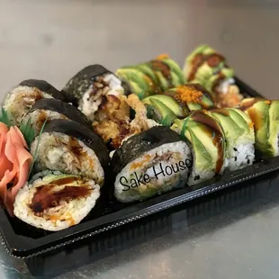 a plate of sushi rolls