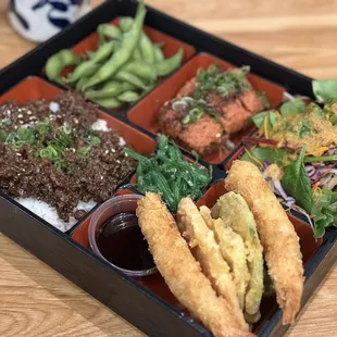 a bento box of food