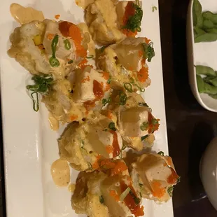 I forget name but had mango and cream cheese inside, deep fried, pineapple on top with spicy Mayo