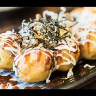 Takoyaki（Grilled wheat cake with octopus)