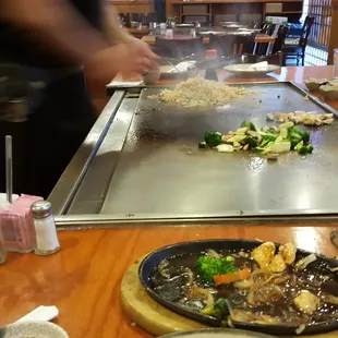 Bob the Raptor Says &quot;If you ask for Hibachi... the grill mammal will cook the prey at the table.&quot;