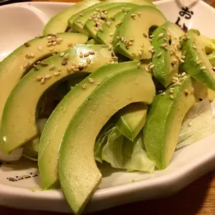 Avocado salad with iceberg lettuce and vinaigrette