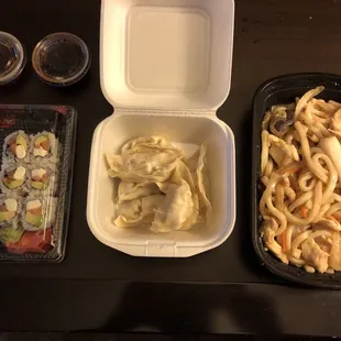 Philly rolls, steamed dumplings, udon noodles with chicken.