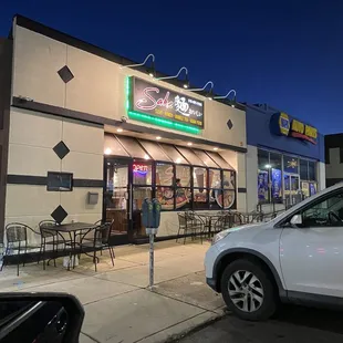 the outside of a restaurant at night
