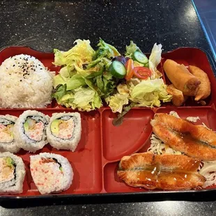 Teriyaki Salmon Bento. California roll had shrimp tempura inside. Nice.