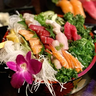 various types of sushi on a plate