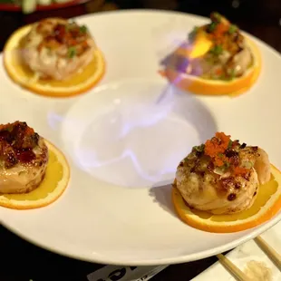 a plate of appetizers on a table