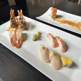 Scallop nigiri, salmon toro nigiri, and sweet shrimp nigiri