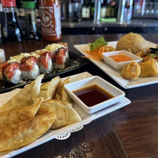 Gyoza, lion king roll and lunch special general tso