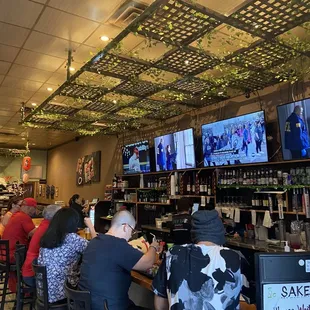people sitting at the bar