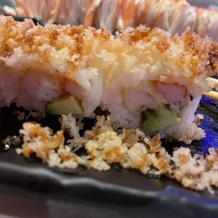 a close up of a plate of sushi