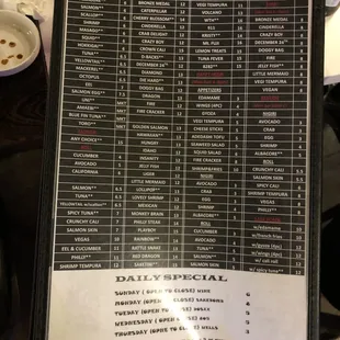 The menu states &quot;A gratuity of 18% for parties of 5 or more&quot;. Also the shrimp tempura roll is listed as $8.