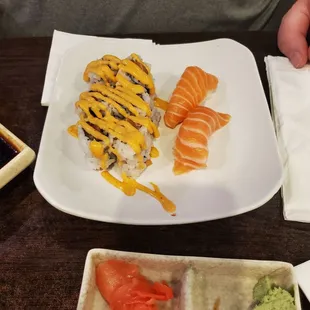 Spicy salmon roll and salmon sushi
