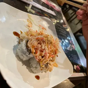 This is a valcano roll with spicy mayo Eel Sauce and w/spicy lean on top