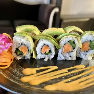 a plate of sushi rolls