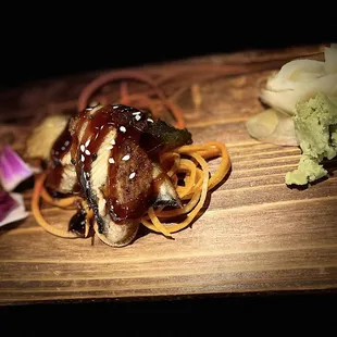 a plate of food on a wooden table