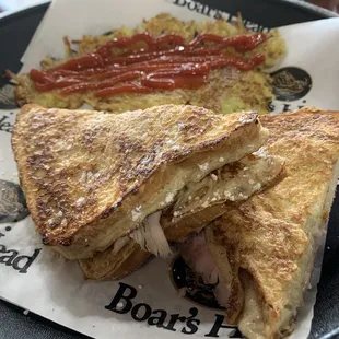 Monte Cristo with turkey, ham, cheese and a French toast finish. Dip it in the syrup, for sure! Really good!