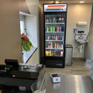 a cash counter with a vending machine