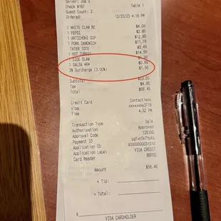 a receipt and a pen