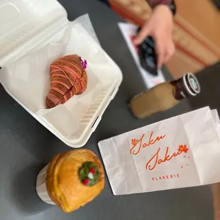 a croissant and a cup of coffee