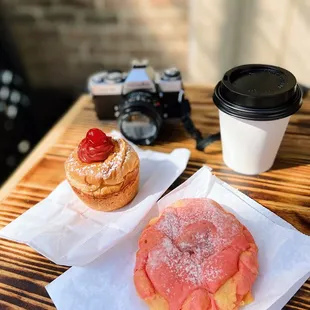 two pastries and a camera
