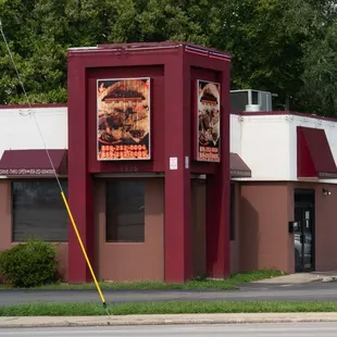 a car parked in front of a restaurant