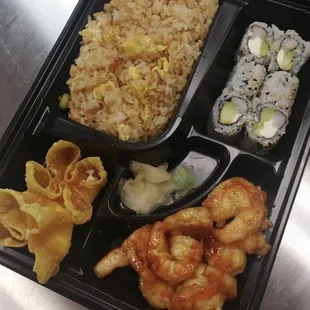 a bento box of food