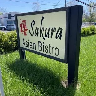 a sign for sakura asian bistro