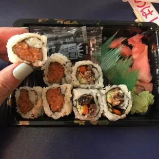 Spicy Tuna Roll and Salmon Skin Roll, respectively. Small and not rolled properly, messy. Salmon Skin tasted like cigarette smoke.